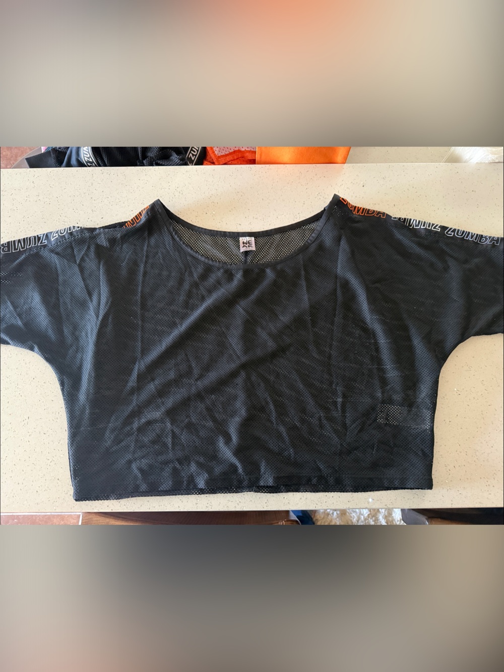 Zumba Fitness Men's Black Mesh Short Sleeve Training Tee with Orange Trim